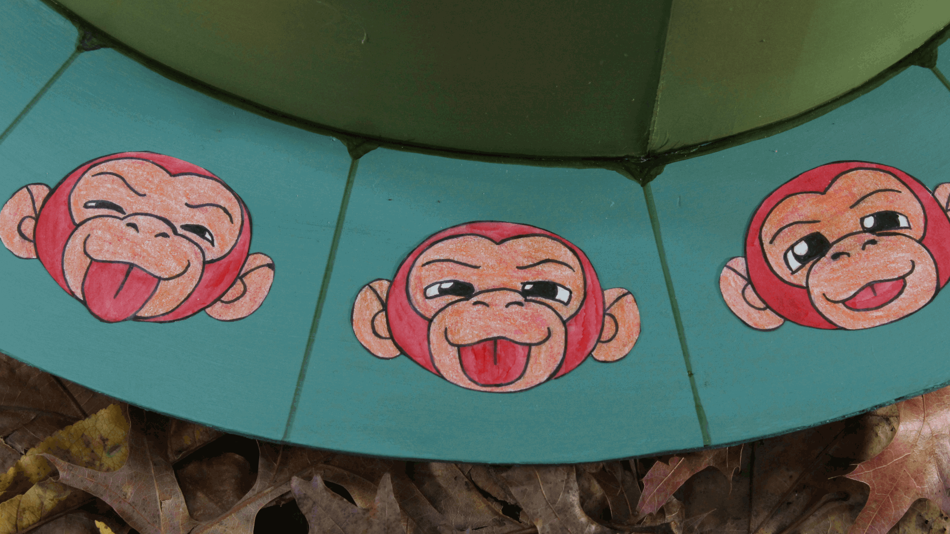Animation of a red monkey sticking out its tongue.